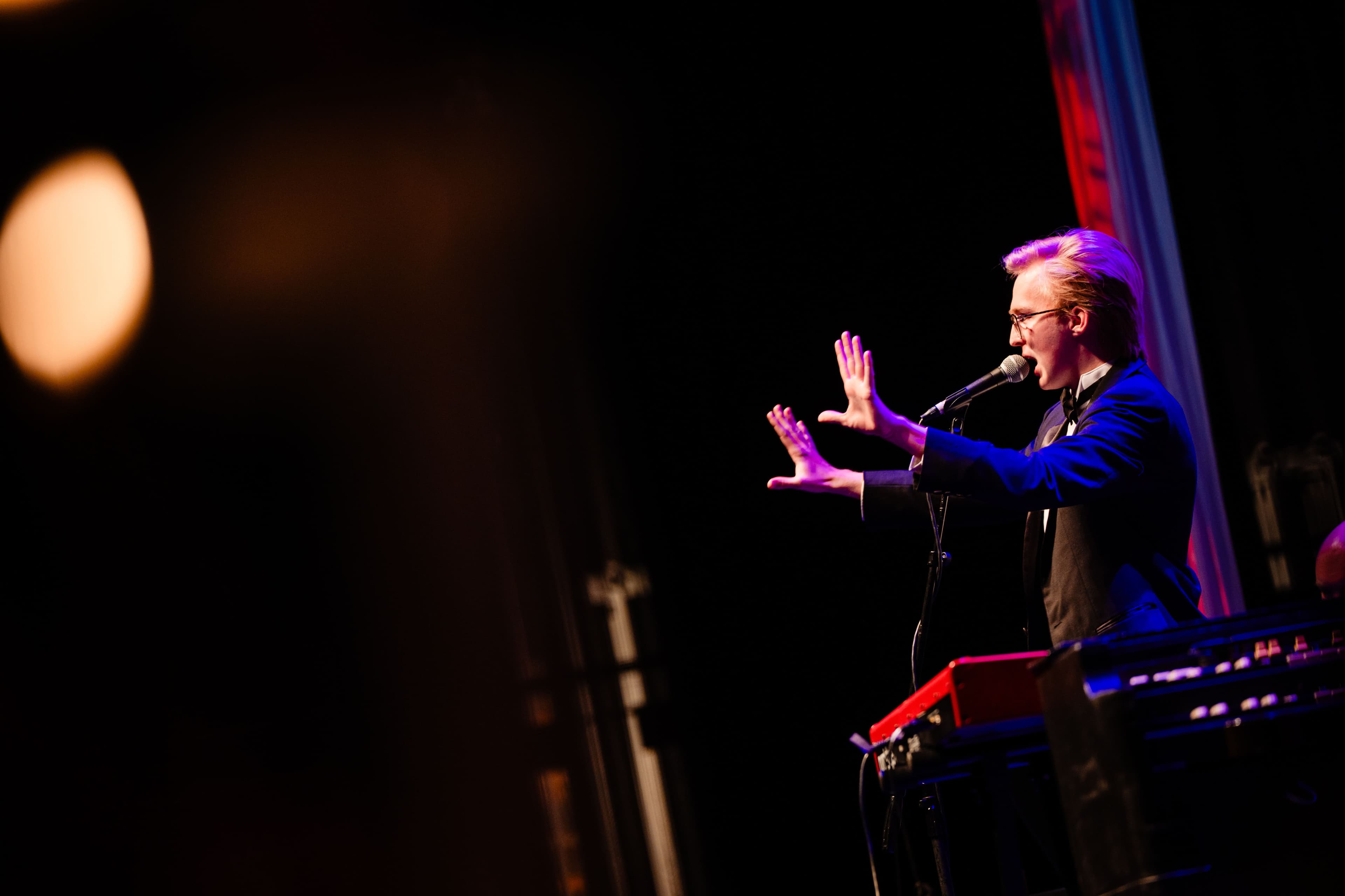 High School Student, JT Loveless performing at Masquerade Ball